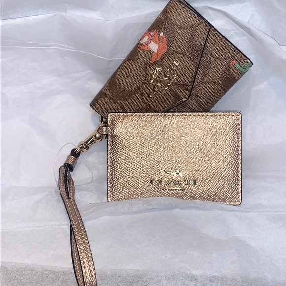 Coach Handbags - NWT Coach limited edition leashed wallet w/mirror